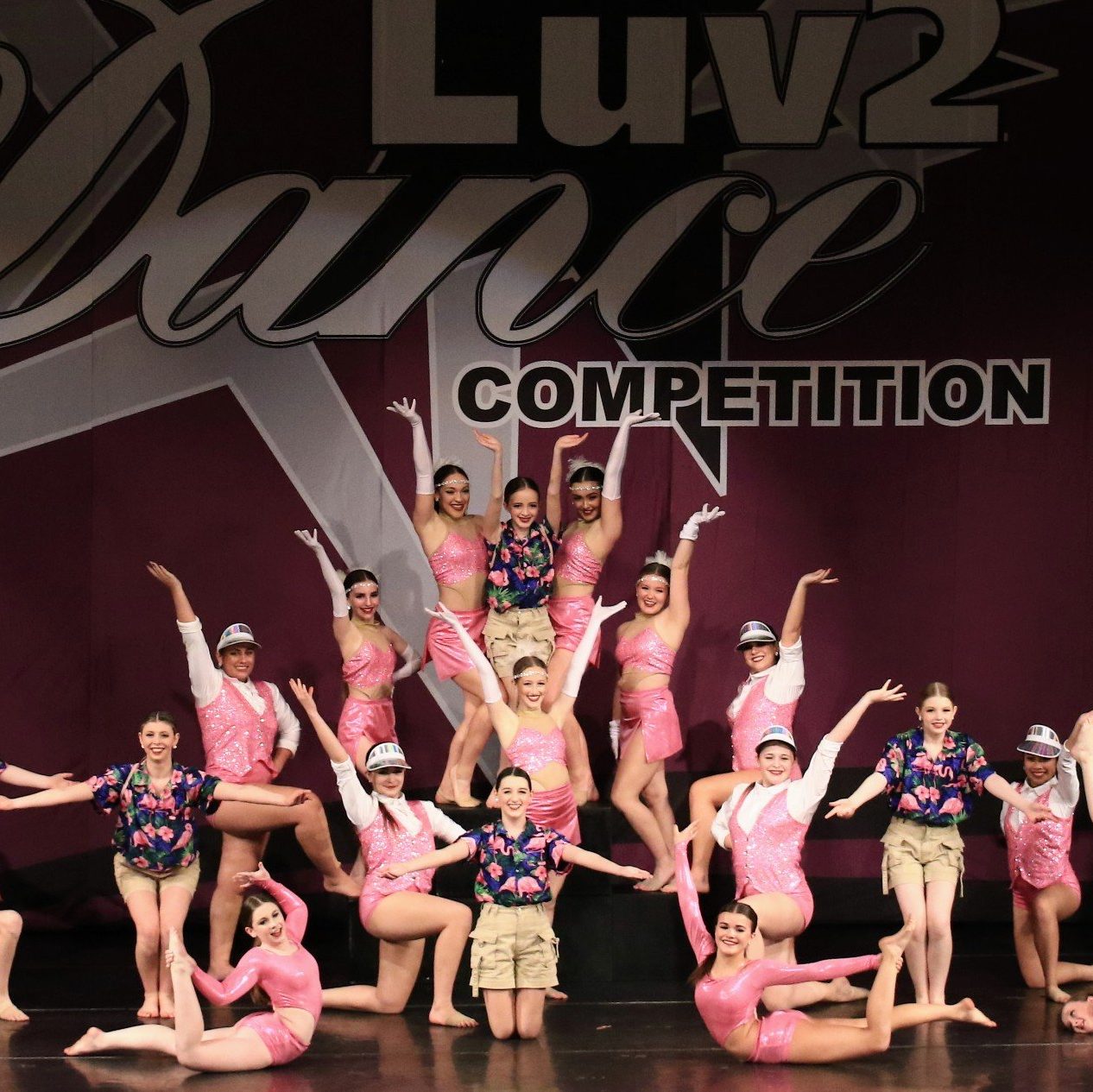 ATJ competitive team 2022 in the ending pose for the production dance number.